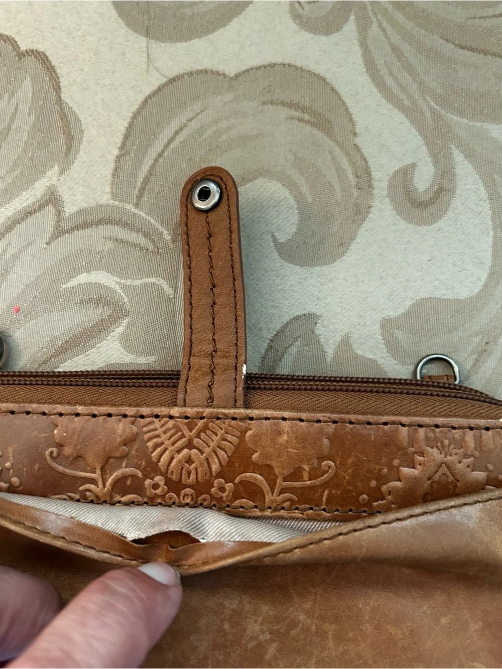 The Sak Smartphone Wristlet Wallet Iris Tobacco Brown Flower Embossed